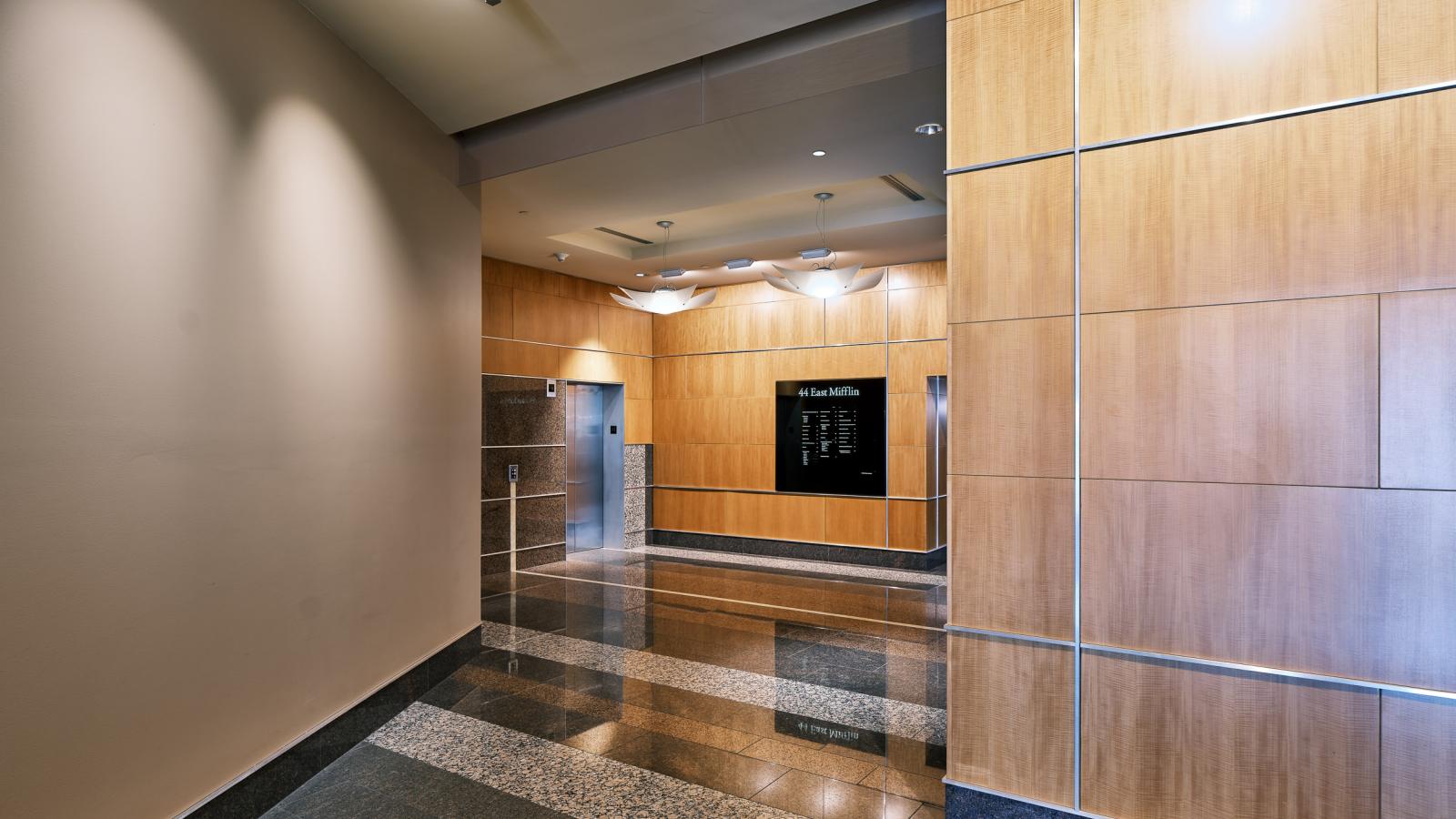 Elegant lobby at 44 East Mifflin with high ceilings and modern finishes