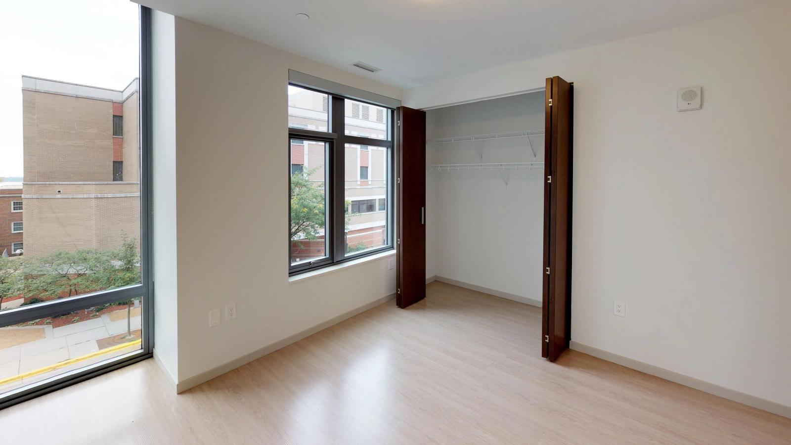 Open-layout two-bedroom apartment at The Pressman in downtown Madison with ample natural light and a contemporary design.
