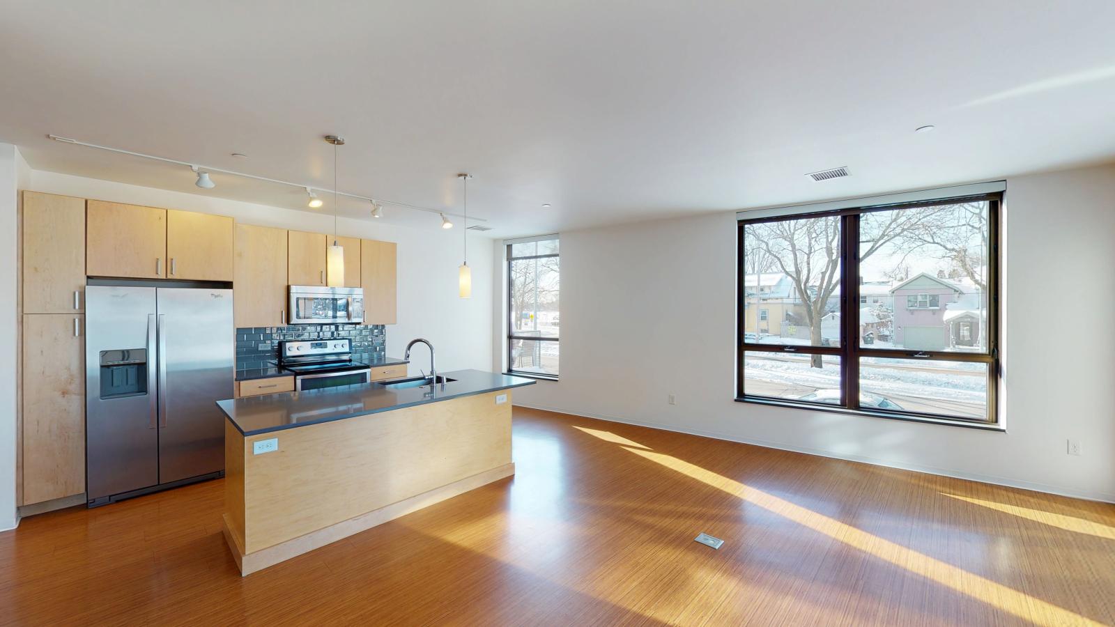 Luxury one bedroom kitchen with built in storage and soft close drawers in a SEVEN27 apartment in downtown Madison