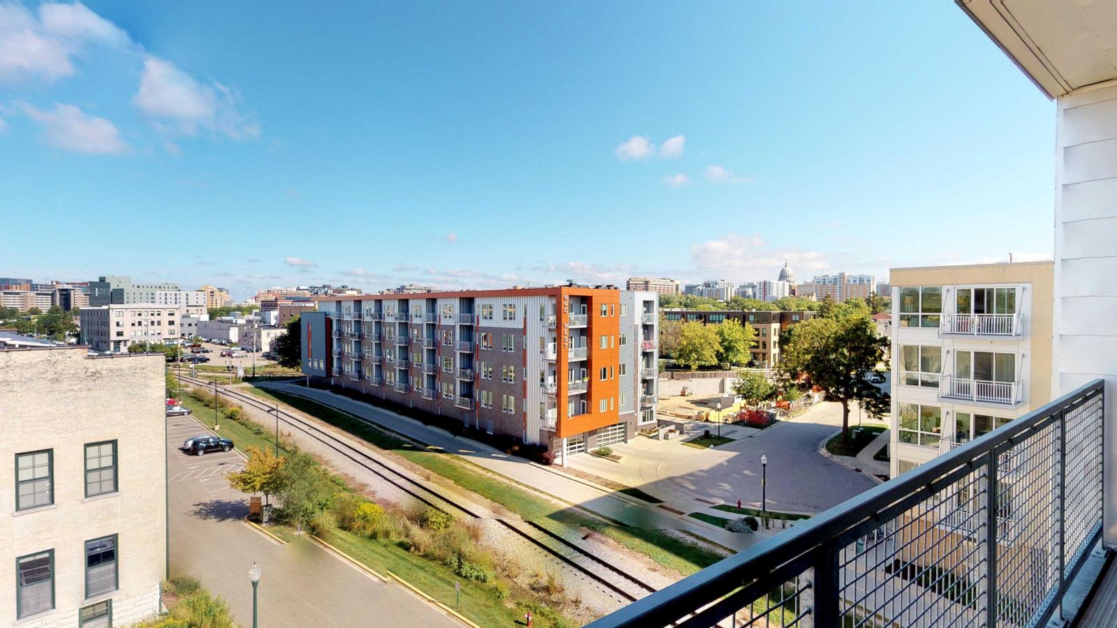 Private balcony with slight Capitol views from a corner two bedroom at SEVEN27