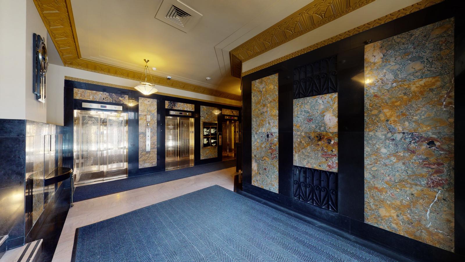 Historic Tenney Plaza features a stunning lobby with original marble and brass fixtures in downtown Madison 